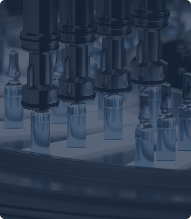 Automated assembly line with small transparent bottles.