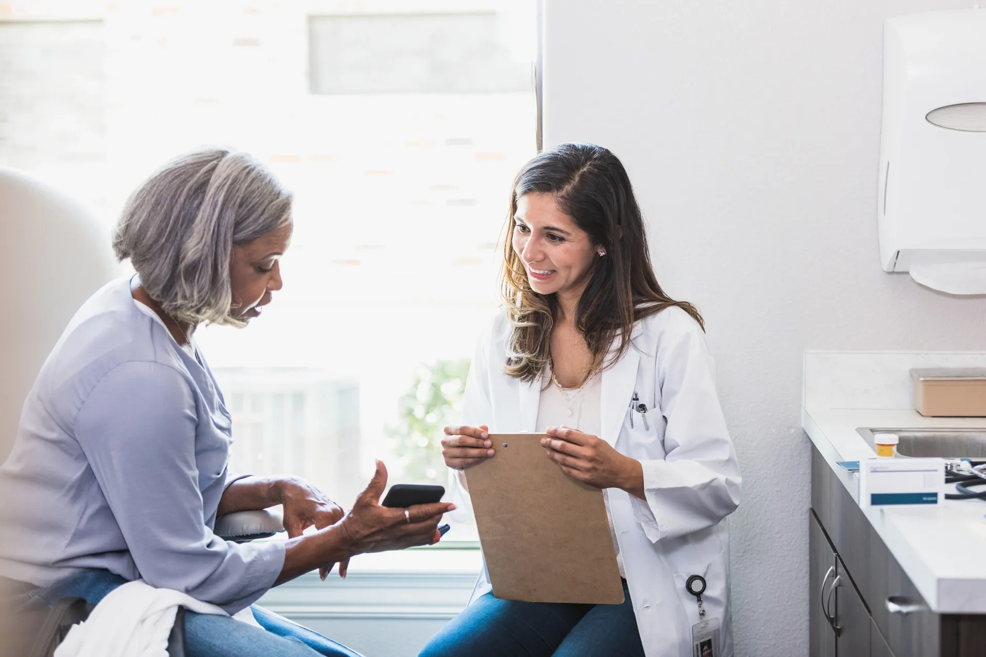 Medical professional advising patient